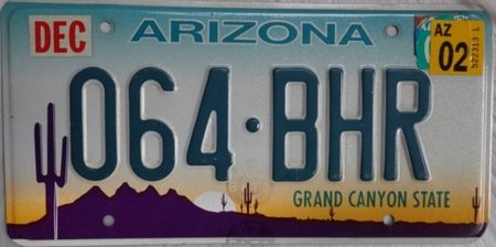 Arizona license plate with state cactus flower